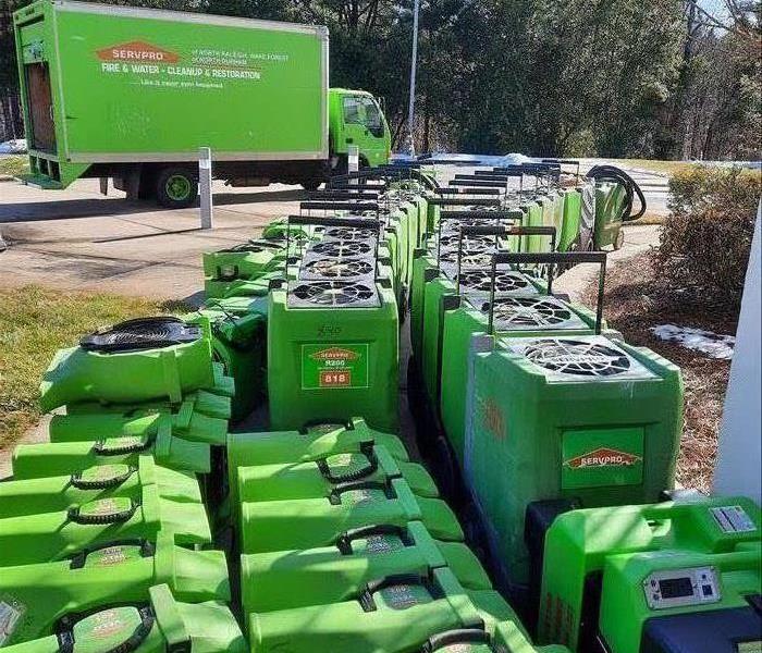 SERVPRO vehicle with loads of equipment outside